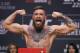 FILE - In this Oct. 5, 2018, file photo, Conor McGregor poses during a ceremonial weigh-in for the UFC 229 mixed martial arts fight in Las Vegas. Nevada fight regulators postponed until next month hearings on suspensions against UFC fighters Conor McGregor and Khabib Nurmagomedov for a brawl after their October match in Las Vegas. (AP Photo/John Locher, file)