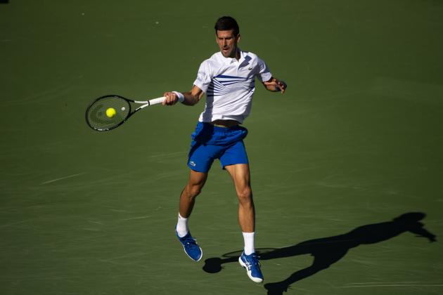 INDIAN WELLS, CALIFORNIA - MARCH 12: Novak Djokovic of Serbia 
hits a forehand against Philipp Kohlschreiber of Germany on March 12, 2019, in the third round of the BNP Paribas Open at Indian Wells Tennis Garden  in Indian Wells, California. (Photo by TPN/Getty Images)