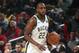 MILWAUKEE, WI - MARCH 19: Khris Middleton #22 of the Milwaukee Bucks handles the ball against the Los Angeles Lakers on March 19, 2019 at the Fiserv Forum Center in Milwaukee, Wisconsin. NOTE TO USER: User expressly acknowledges and agrees that, by downloading and or using this Photograph, user is consenting to the terms and conditions of the Getty Images License Agreement. Mandatory Copyright Notice: Copyright 2019 NBAE (Photo by Nathaniel S. Butler/NBAE via Getty Images).