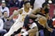CORRECTS YEAR TO 2019 NOT 2018 - Houston Rockets guard James Harden, right, drives past Atlanta Hawks guard Kent Bazemore during the first half of an NBA basketball game, Monday, Feb. 25, 2019, in Houston. (AP Photo/Eric Christian Smith)