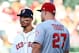 BOSTON, MA - JUNE 26: Mike Trout #27 of the Los Angeles Angels talks to Mookie Betts #50 of the Boston Red Sox before a game against the Boston Red Sox at Fenway Park on June 26, 2018 in Boston, Massachusetts. (Photo by Adam Glanzman/Getty Images)