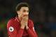 Liverpool's English defender Trent Alexander-Arnold reacts after drawing the English Premier League football match between Everton and Liverpool at Goodison Park in Liverpool, north west England on March 3, 2019. (Photo by Oli SCARFF / AFP) / RESTRICTED TO EDITORIAL USE. No use with unauthorized audio, video, data, fixture lists, club/league logos or 'live' services. Online in-match use limited to 120 images. An additional 40 images may be used in extra time. No video emulation. Social media in-match use limited to 120 images. An additional 40 images may be used in extra time. No use in betting publications, games or single club/league/player publications. / (Photo credit should read OLI SCARFF/AFP/Getty Images)