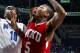 Memphis forward Tarik Black (10) shoots defended by defended by Western Kentucky forward Cliff Dixon (5) in the second half of an NCAA college basketball game Saturday, Dec. 4, 2010, in Memphis, Tenn. (AP Photo/Nikki Boertman)