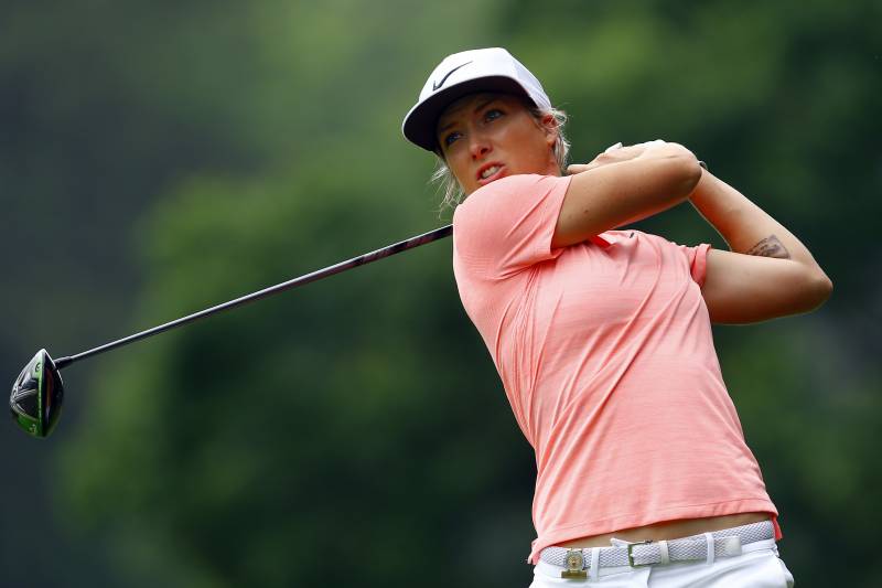 Mel Reid, of England, tees off on the 10th hole during the first round of the U.S. Women's Open golf tournament, Thursday, May 31, 2018, in Shoal Creek, Ala. (AP Photo/Butch Dill)