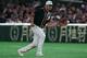 TOKYO, JAPAN - MARCH 17: Infielder Matt Olson #28 of the Oakland Athletics fields a grounder in the bottom of 4th inning during the game between Hokkaido Nippon-Ham Fighters and Oakland Athletics at Tokyo Dome on March 17, 2019 in Tokyo, Japan. (Photo by Masterpress/Getty Images)