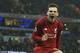Liverpool's Andrew Robertson celebrates after his teammate Liverpool's Roberto Firmino scored his sides 1st goal during their English Premier League soccer match between Manchester City and Liverpool at the Ethiad stadium, Manchester England, Thursday, Jan. 3, 2019. (AP Photo/Jon Super)