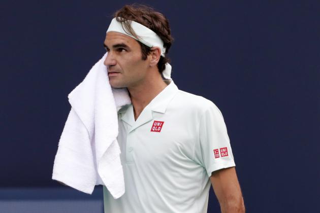 Roger Federer, of Switzerland, wipes his face during his match against Radu Albot, of Moldova, at the Miami Open tennis tournament Saturday, March 23, 2019, in Miami Gardens, Fla. (AP Photo/Lynne Sladky)