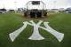 The New York Yankees logo is painted on the field before an exhibition baseball game between the Yankees and the Pittsburgh Pirates Thursday, Feb. 27, 2014, in Tampa, Fla. (AP Photo/Charlie Neibergall)