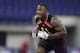 LSU linebacker Devin White runs a drill at the NFL football scouting combine in Indianapolis, Sunday, March 3, 2019. (AP Photo/Michael Conroy)