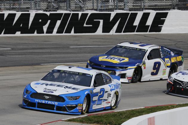 Brad Keselowski (2) leads Chase Elliott (9) as they drive into Turn 4 during a NASCAR Cup Series auto race at Martinsville Speedway in Martinsville, Va., Sunday, March 24, 2019. (AP Photo/Steve Helber)