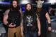 NEW YORK, NY - MARCH 29: WWE Superstars Braun Strowman, Bray Wyatt and Erick Rowan ring The New York Stock Exchange Opening Bell in honor of WrestleMania 32 at New York Stock Exchange on March 29, 2016 in New York City. (Photo by Jamie McCarthy/Getty Images)