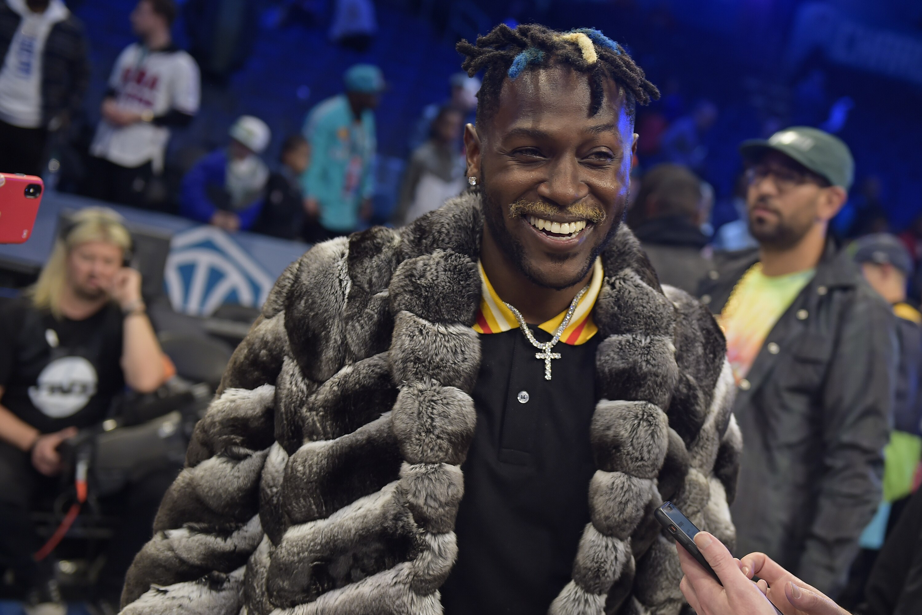 CHARLOTTE, NC - FEBRUARY 17: NFL player, Antonio Brown smiles and laughs during the 2019 NBA All-Star Game on February 17, 2019 at Spectrum Center in Charlotte, North Carolina. NOTE TO USER: User expressly acknowledges and agrees that, by downloading and or using this photograph, User is consenting to the terms and conditions of the Getty Images License Agreement. Mandatory Copyright Notice: Copyright 2019 NBAE (Photo by Tom O'Connor/NBAE via Getty Images)