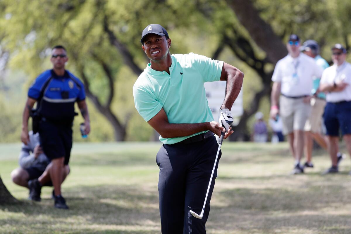 Tiger Woods Hits Amazing Shot from Knees Out of Bush at WGC-Dell Match