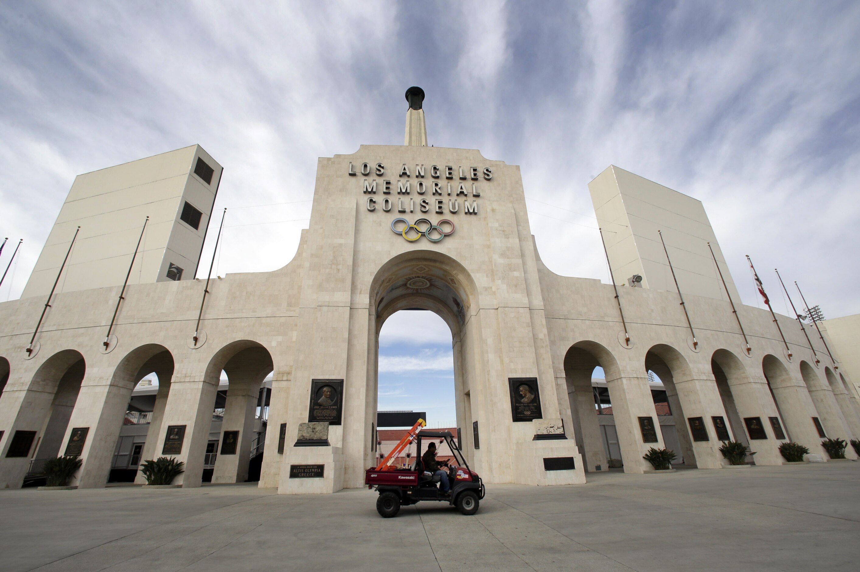 FILE - This Jan. 13, 2016 file photo shows the peristyle of the Los Angeles Memorial Coliseum in Los Angeles. The University of Southern California's sale of naming rights for Los Angeles Memorial Coliseum is being criticized as dishonoring the historic stadium's dedication as a memorial to soldiers who fought and died in World War I. USC announced last year that the stadium will be renamed United Airlines Memorial Coliseum as part of a $270 million renovation of the facility, which opened in 1923. (AP Photo/Nick Ut, File)