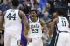 Michigan State forward Xavier Tillman (23) turns to looks at teammates Nick Ward (44) and Aaron Henry (11) after scoring against LSU during the first half of an East Regional semifinal in the NCAA men's college basketball tournament in Washington, Friday, March 29, 2019. (AP Photo/Patrick Semansky)