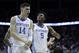 Kentucky's Tyler Herro (14) and Immanuel Quickley celebrate following a men's NCAA tournament college basketball Midwest Regional semifinal game against Houston Friday, March 29, 2019, in Kansas City, Mo. (AP Photo/Charlie Riedel)