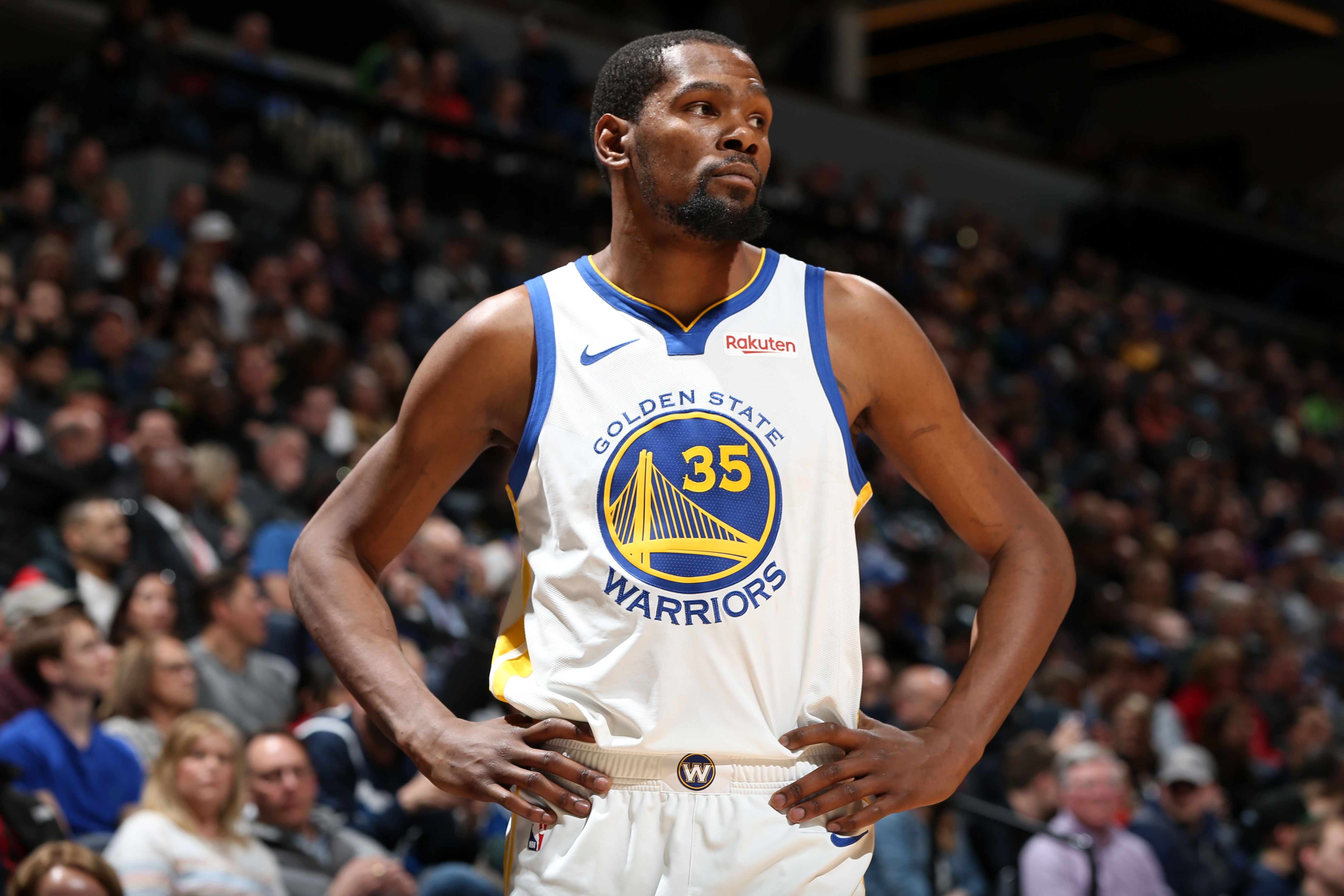 MINNEAPOLIS, MN - MARCH 29: Kevin Durant #35 of the Golden State Warriors looks on during the game against the Minnesota Timberwolves on March 29, 2019 at Target Center in Minneapolis, Minnesota. NOTE TO USER: User expressly acknowledges and agrees that, by downloading and/or using this photograph, user is consenting to the terms and conditions of the Getty Images License Agreement. Mandatory Copyright Notice: Copyright 2019 NBAE (Photo by David Sherman/NBAE via Getty Images)