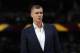 FILE - In this March 14, 2019, file photo, Dallas Mavericks forward Kristaps Porzingis stands during the second half of the team's NBA basketball game against the Denver Nuggets in Denver. An attorney for Porzingis acknowledges that a woman has accused the NBA star of rape, but “unequivocally” denies the allegation. Lawyer Roland Riopelle said Saturday, March 30, that the claim against the Dallas Maverick was part of an extortion attempt that is being investigated by the FBI. (AP Photo/David Zalubowski, File)