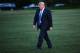 US President Donald Trump makes his way across the South Lawn upon return to the White House in Washington, DC, on August 13, 2018. - Trump returned to Washington after vacationing at his Bedminster, New Jersey golf resort. (Photo by MANDEL NGAN / AFP) (Photo credit should read MANDEL NGAN/AFP/Getty Images)