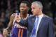 Phoenix Suns head coach Igor Kokoskov, right, talks with Suns guard Jamal Crawford during a timeout in the first half of an NBA basketball game against the San Antonio Spurs, Tuesday, Jan. 29, 2019, in San Antonio. (AP Photo/Darren Abate)