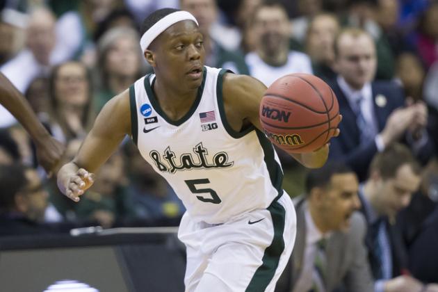 Michigan State guard Cassius Winston (5) drives with the ball during the first half of an NCAA men's college East Regional semifinal basketball game against LSU in Washington, Friday, March 29, 2019. (AP Photo/Alex Brandon)