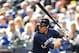 MILWAUKEE, WISCONSIN - MARCH 31: Christian Yelich #22 of the Milwaukee Brewers at bat during a game against the St. Louis Cardinals at Miller Park on March 31, 2019 in Milwaukee, Wisconsin. (Photo by Stacy Revere/Getty Images)
