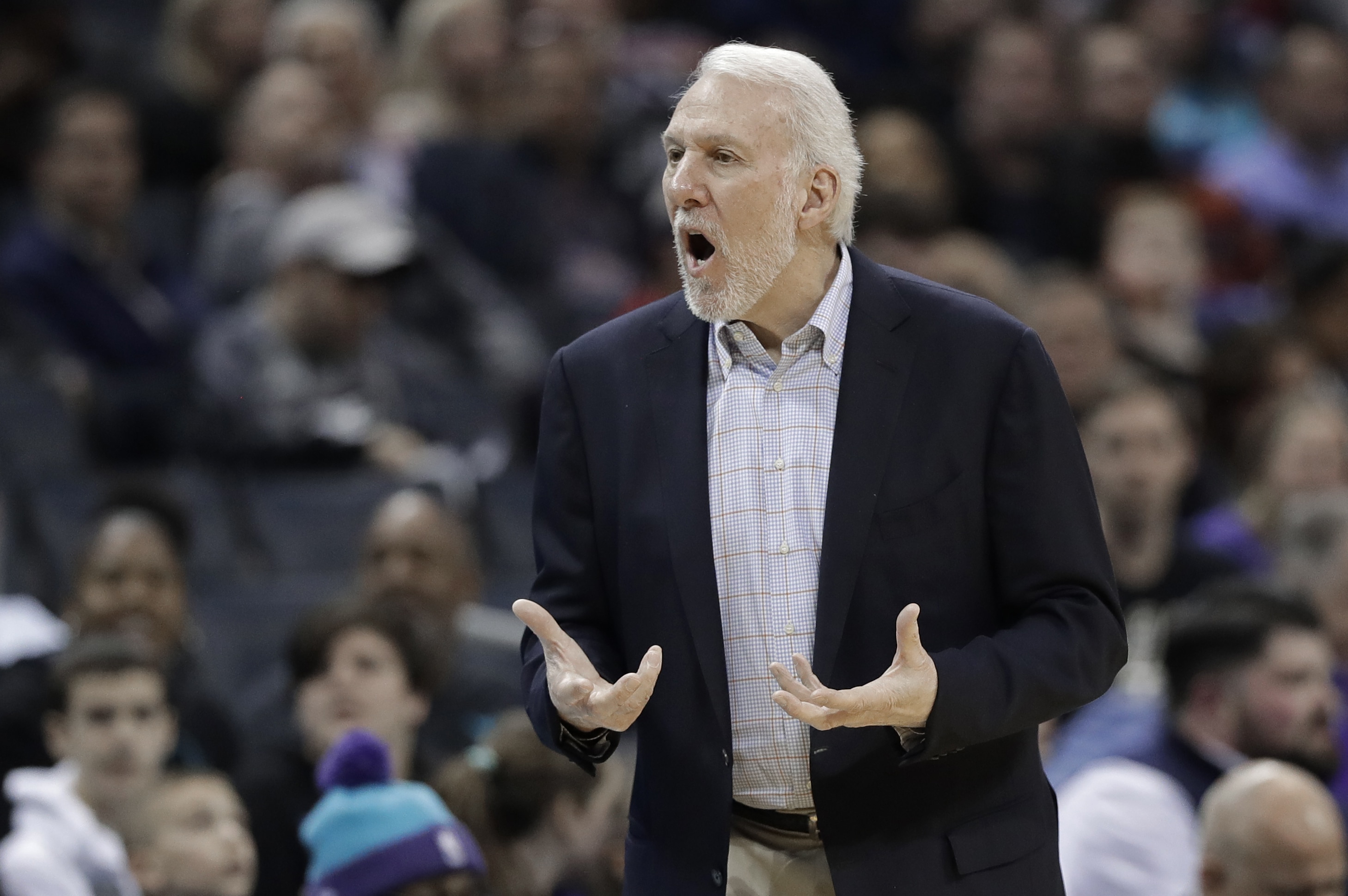 San Antonio Spurs head coach Gregg Popovich argues a call during the first half of an NBA basketball game against the Charlotte Hornets in Charlotte, N.C., Tuesday, March 26, 2019. (AP Photo/Chuck Burton)
