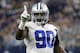 FILE - In this Dec. 23, 2018, file photo, Dallas Cowboys defensive end DeMarcus Lawrence (90) celebrates as Tampa Bay Buccaneers quarterback Jameis Winston shouts in the direction of an official after throwing an incomplete pass during the second half of an NFL football game in Arlington, Texas. A person with direct knowledge of the deal says the Cowboys have agreed on a $105 million, five-year contract with Lawrence. The agreement will include $65 million in guaranteed money, the person told The Associated Press on condition of anonymity Friday, April 5, because the deal hasn’t been announced. (AP Photo/Michael Ainsworth, File)