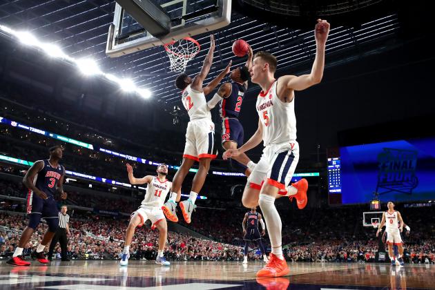 MINNEAPOLIS, MINNESOTA - APRIL 06: De'Andre Hunter #12 of the Virginia Cavaliers blocks a dunk by Bryce Brown #2 of the Auburn Tigers in the second half during the 2019 NCAA Final Four semifinal at U.S. Bank Stadium on April 6, 2019 in Minneapolis, Minnesota. (Photo by Tom Pennington/Getty Images)