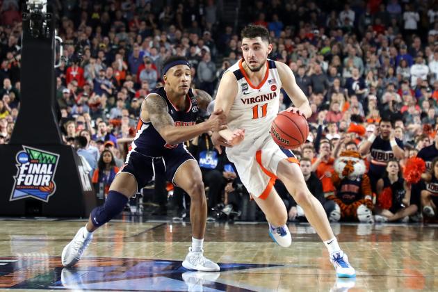 MINNEAPOLIS, MINNESOTA - APRIL 06: Ty Jerome #11 of the Virginia Cavaliers dribbles against Bryce Brown #2 of the Auburn Tigers in the second half during the 2019 NCAA Final Four semifinal at U.S. Bank Stadium on April 6, 2019 in Minneapolis, Minnesota. (Photo by Streeter Lecka/Getty Images)