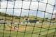 Players of Cuba's Los Leneros de las Tunas and Venezuela's Cardenales de Lara play in the Caribbean Series baseball tournament at Rod Carew stadium in Panama City, Saturday, Feb. 9, 2019.