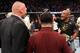 LAS VEGAS, NV - JULY 07: Daniel Cormier confronts Brock Lesnar after his UFC heavyweight championship fight during the UFC 226 event inside T-Mobile Arena on July 7, 2018 in Las Vegas, Nevada. (Photo by Josh Hedges/Zuffa LLC/Zuffa LLC via Getty Images)