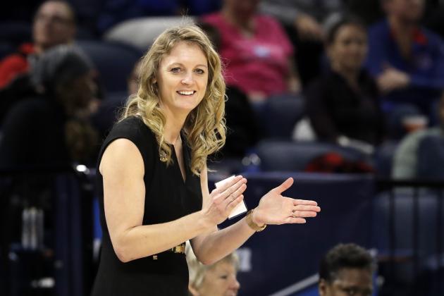 Missouri State head coach Kellie Harper smiles as he directs her team during the second half of a regional semifinal game against the Stanford in the NCAA women's college basketball tournament, Saturday, March 30, 2019, in Chicago. (AP Photo/Nam Y. Huh)
