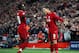 LIVERPOOL, ENGLAND - APRIL 09: Roberto Firmino of Liverpool celebrates after scoring his team's second goal with Sadio Mane of Liverpool during the UEFA Champions League Quarter Final first leg match between Liverpool and Porto at Anfield on April 09, 2019 in Liverpool, England. (Photo by Julian Finney/Getty Images)