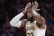 Los Angeles Lakers forward LeBron James reacts after being charged with a foul during the second half of an NBA basketball game against the Orlando Magic Sunday, Nov. 25, 2018, in Los Angeles. The Magic won 108-104. (AP Photo/Mark J. Terrill)
