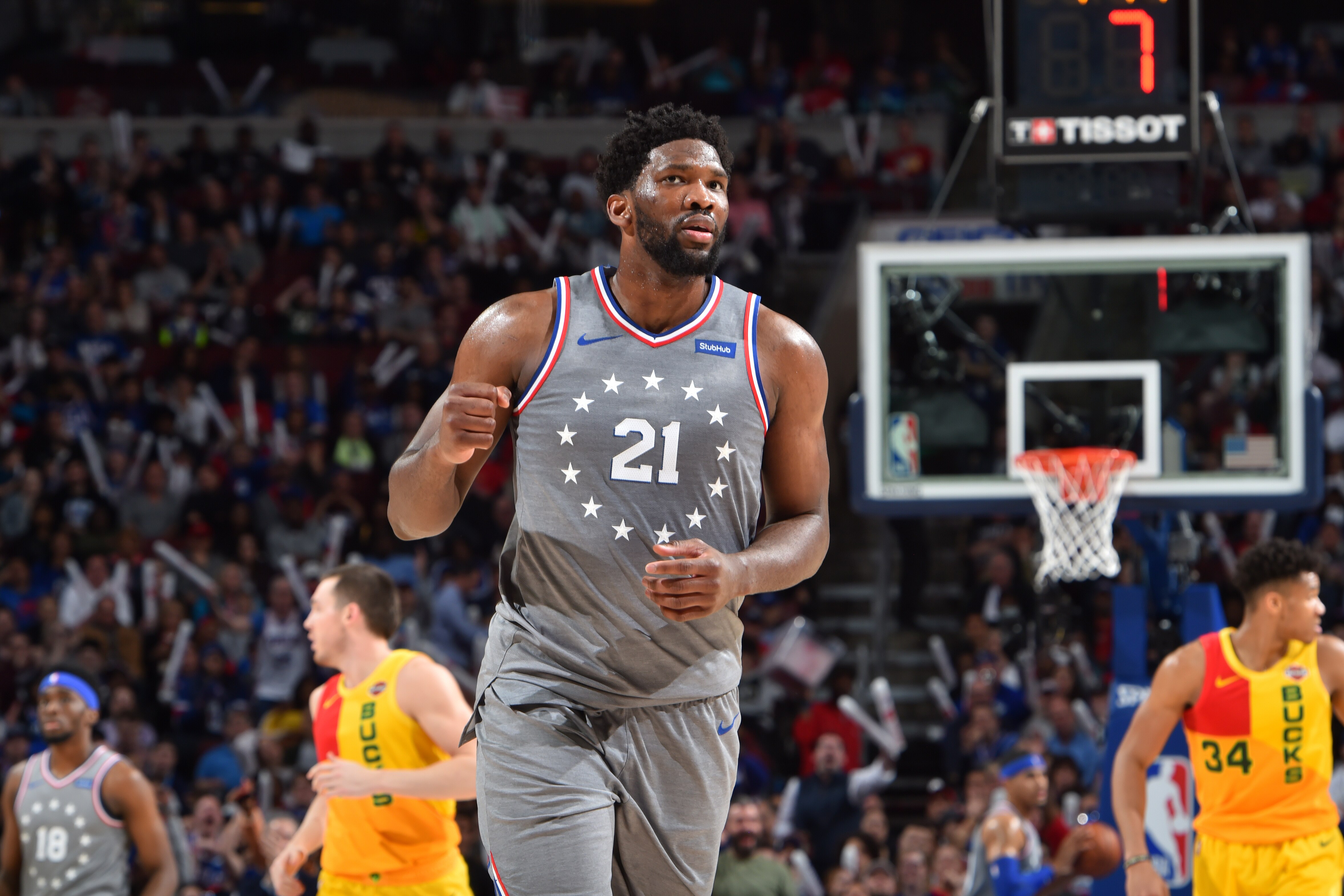 PHILADELPHIA, PA - APRIL 4: Joel Embiid #21 of the Philadelphia 76ers reacts during a game against the Milwaukee Bucks on April 4, 2019 at the Wells Fargo Center in Philadelphia, Pennsylvania NOTE TO USER: User expressly acknowledges and agrees that, by downloading and/or using this Photograph, user is consenting to the terms and conditions of the Getty Images License Agreement. Mandatory Copyright Notice: Copyright 2019 NBAE (Photo by Jesse D. Garrabrant/NBAE via Getty Images)