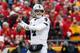 Oakland Raiders quarterback Derek Carr (4) throws a pass during the first half of an NFL football game against the Kansas City Chiefs in Kansas City, Mo., Sunday, Dec. 30, 2018. (AP Photo/Charlie Riedel)