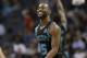 Charlotte Hornets' Kemba Walker (15) reacts after a basket against the Philadelphia 76ers during the second half of an NBA basketball game in Charlotte, N.C., Tuesday, March 19, 2019. (AP Photo/Chuck Burton)