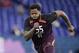Florida offensive lineman Jawaan Taylor runs a drill at the NFL football scouting combine in Indianapolis, Friday, March 1, 2019. (AP Photo/Michael Conroy)