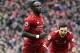 LIVERPOOL, ENGLAND - APRIL 14: Sadio Mane of Liverpool celebrates after scoring his team's first goal with Andy Robertson during the Premier League match between Liverpool FC and Chelsea FC at Anfield on April 14, 2019 in Liverpool, United Kingdom. (Photo by Michael Regan/Getty Images)