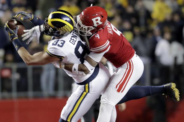 Michigan tight end Zach Gentry, left, makes a catch as Rutgers defensive back Saquan Hampton defends during the second half of an NCAA college football game, Saturday, Nov. 10, 2018, in Piscataway, N.J. (AP Photo/Julio Cortez)