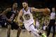 Golden State Warriors' Stephen Curry, right, drives the ball around Los Angeles Clippers' Lou Williams (23) during the second half in Game 1 of a first-round NBA basketball playoff series Saturday, April 13, 2019, in Oakland, Calif. (AP Photo/Ben Margot)