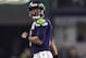 ARLINGTON, TEXAS - JANUARY 05: Russell Wilson #3 of the Seattle Seahawks walks off the field after falling short on third down against the Dallas Cowboys in the Wild Card Round at AT&T Stadium on January 05, 2019 in Arlington, Texas. (Photo by Ronald Martinez/Getty Images)