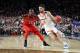 MINNEAPOLIS, MINNESOTA - APRIL 08: Ty Jerome #11 of the Virginia Cavaliers is defended by Norense Odiase #32 of the Texas Tech Red Raiders in the second half during the 2019 NCAA men's Final Four National Championship game at U.S. Bank Stadium on April 08, 2019 in Minneapolis, Minnesota. (Photo by Streeter Lecka/Getty Images)