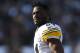 OAKLAND, CA - DECEMBER 09: Antonio Brown #84 of the Pittsburgh Steelers looks on as he walks onto the field against the Oakland Raiders during the first half of their NFL football game at Oakland-Alameda County Coliseum on December 9, 2018 in Oakland, California. (Photo by Thearon W. Henderson/Getty Images)