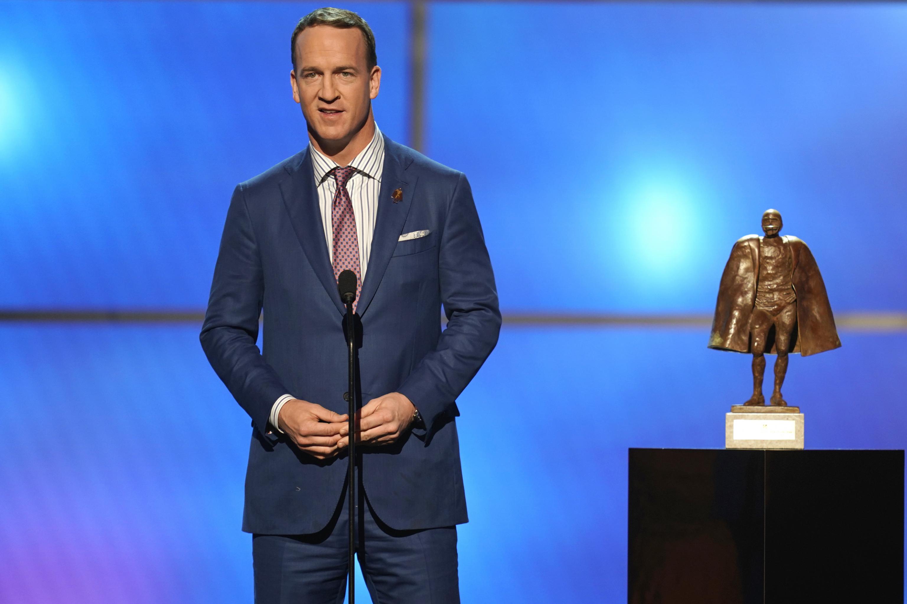 Manning hosts fun, spirited ESPN series on NFL's history