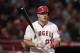 Los Angeles Angels' Mike Trout gets ready for his at bat during the first inning of a baseball game against the Milwaukee Brewers, Tuesday, April 9, 2019, in Anaheim, Calif. (AP Photo/Jae C. Hong)