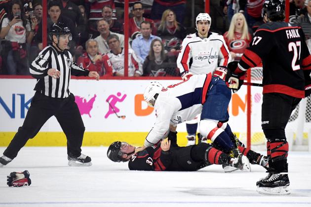RALEIGH, NORTH CAROLINA - APRIL 15: Alex Ovechkin #8 of the Washington Capitals knocks out Andrei Svechnikov #37 of the Carolina Hurricanes as they fight during the first period in Game Three of the Eastern Conference First Round during the 2019 NHL Stanley Cup Playoffs at PNC Arena on April 15, 2019 in Raleigh, North Carolina. (Photo by Grant Halverson/Getty Images)