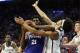 Philadelphia 76ers' Joel Embiid, left, of Cameroon, with the flaguant 1 foul on Brooklyn Nets' Jarrett Allen, right, as he was going for the shot during the first half in Game 2 of a first-round NBA basketball playoff series, Monday, April 15, 2019, in Philadelphia. (AP Photo/Chris Szagola)