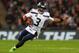 LONDON, ENGLAND - OCTOBER 14: Russell Wilson of Seattle Seahawks in action during the NFL International series match between Seattle Seahawks and Oakland Raiders at Wembley Stadium on October 14, 2018 in London, England. (Photo by Naomi Baker/Getty Images)